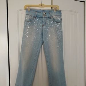 Rhinestone studded Capri jeans by cache'.